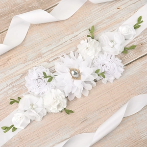White floral maternity sash with green leaves and rhinestone detail for baby shower dress