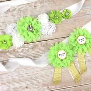 Floral maternity sash with Mommy and Daddy To Be pins for baby shower party decoration