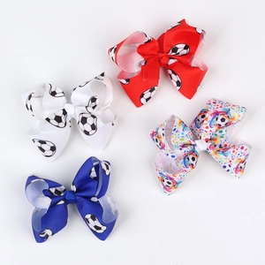 Set di quattro fermagli per capelli a fiocco da calcio per bambini in grosgrain
