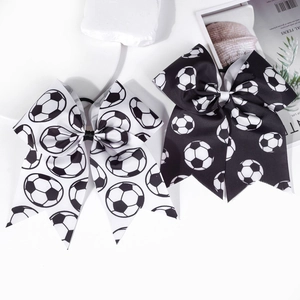 Two-pack soccer pattern grosgrain ribbon cheer bows with stylish black and white football prints