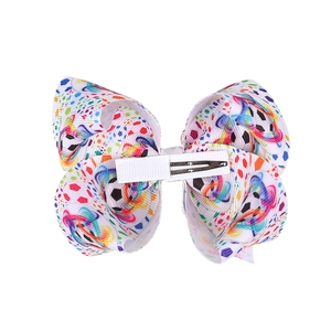 Fermaglio per capelli calcio per bambini con fiocco stampato e macchie colorate