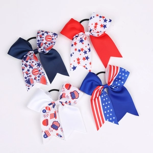 Independence Day hair ties set featuring 4 patriotic red white and blue bow elastics