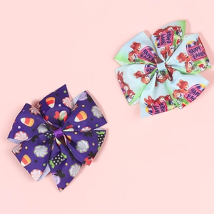Detail of colorful Easter bows with rabbit and candy prints on grosgrain ribbon