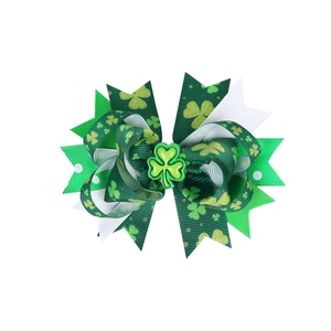 Nœud pour cheveux Saint-Patrick avec motifs trèfles verts et pièce centrale