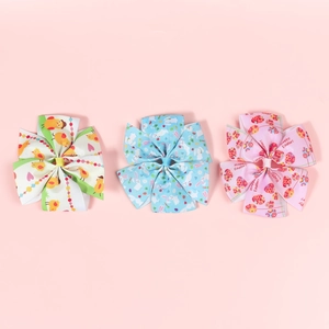 Detailed macro of Easter themed grosgrain ribbon bows with bunny and colorful egg prints