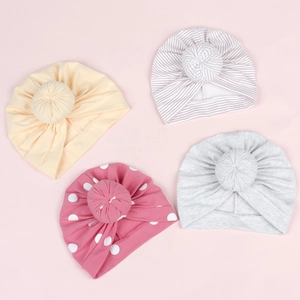 Lot de quatre turbans pour bébés en coton avec nœuds, motifs à rayures et à pois