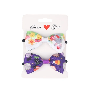Set of two children's bow hair ties featuring Easter rabbit and colorful floral patterns