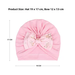 Pink infant turban hat with gold star bow details and exact size measurements