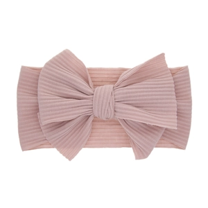 Bandeau élastique pour bébé avec grand nœud rose poudré en tissu côtelé