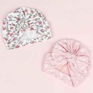 Détails de bonnets turban pour bébé avec grands nœuds et motifs floraux ou à pois