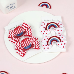 Independence Day hair bows with red stripes and stars patterns on white display cards