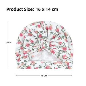 Bonnet turban bébé à fleurs avec nœud, dimensions de 16cm par 14cm en coton doux