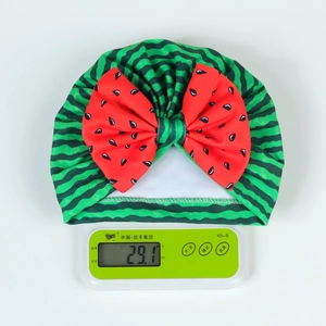 Watermelon pattern baby turban with large bow detail weighing 29.1 grams