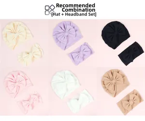 Detail view of baby knot hats and matching bow headbands in six pastel ribbed knit colors