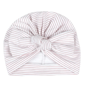 Bonnet turban rayé rose pour bébé avec un grand nœud pour nourrissons de zéro à six mois