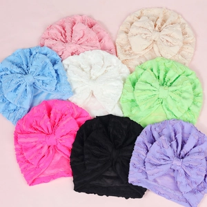 Set of 8 colorful baby turban hats with large bow accents in soft wrinkled lace fabric