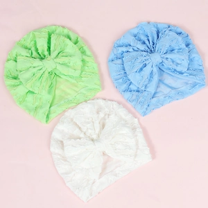 Three-piece infant turban set with large bows in light green, sky blue, and white colors