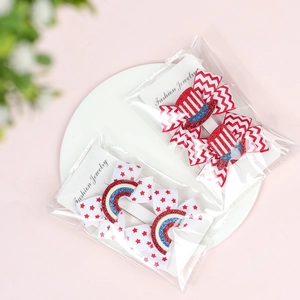 Detail of USA Independence Day bows with stars and stripes patterns on a display card