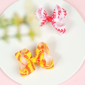 3-inch baseball pattern hair bow clips with vibrant red stitching on high-density ribbon