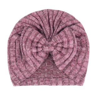 Détail du turban pour nouveau-né montrant la maille côtelée douce et le grand nœud décoratif