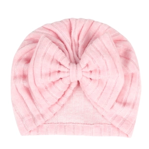 Bonnet turban rose en maille côtelée pour nouveau-né avec un grand nœud décoratif