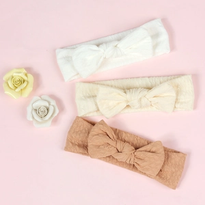 Three-piece infant headbands with soft waffle knit fabric and 3D bow details