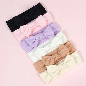6-pack of soft baby headbands with bow and textured knit fabric in various colors