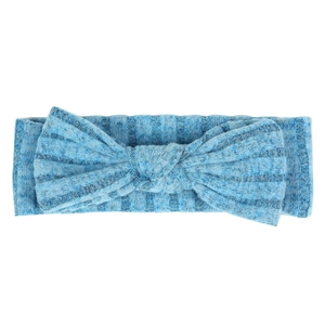 Detail of light blue ribbed knit baby headband featuring a large bow knot decoration