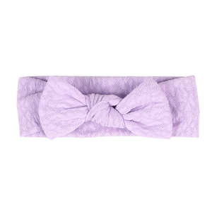 Detail of lavender baby headband with elastic diamond-knit texture and soft bunny ear bow