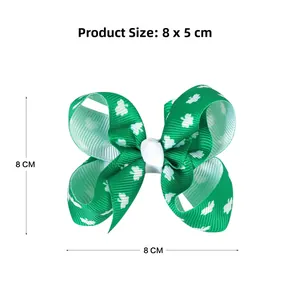 Détail du nœud pour cheveux de 3 pouces pour la Saint-Patrick avec trèfles blancs