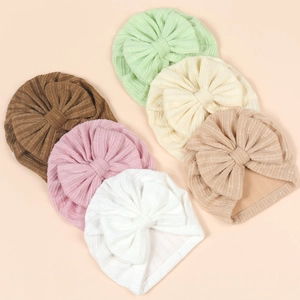 Soft ribbed knit baby turban hats with large bows in six assorted Morandi colors