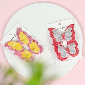 Sparkly glitter butterfly hair clips for girls featuring double-layered sequin fabric