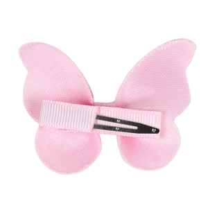 Detail of pink fabric butterfly hair clip showing back side with non-slip metal duckbill clip