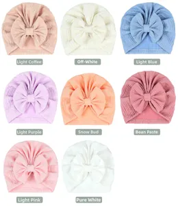 Detailed view of 8 colors available for baby bow beanies in soft ribbed knitted fabric