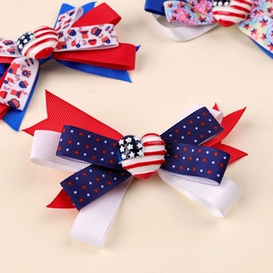Handmade American flag bow hair clips with stars and stripes for Independence Day