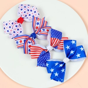 Set of 4 patriotic Independence Day hair bows with US flag stars and stripes patterns