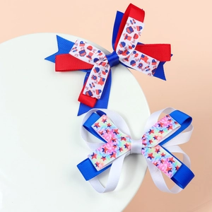 Patriotic USA Independence Day hair bows with stars and stripes patterns for girls