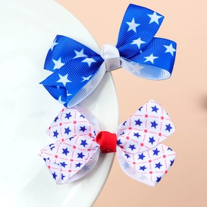 Set of two American Independence Day themed hair clips with stars and stripe patterns