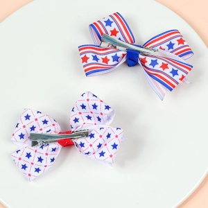 Detail of American Independence Day hair bows with red white and blue star patterns