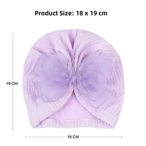 Detailed view of lavender baby turban hat with oversized bow and 18x19cm size guide