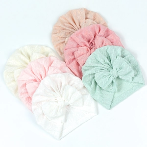 Baby turban set with large bows in six pastel colors made of breathable jacquard fabric