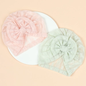 Newborn lace turban hats with large jacquard bows in soft pink and light green