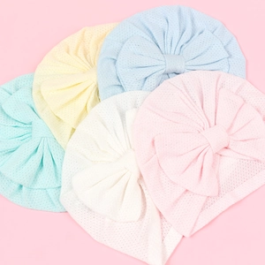 Detailed set of five ultra-thin breathable baby turbans with large bows in pastel colors
