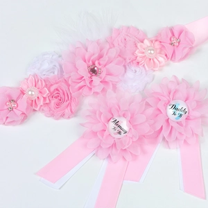 Pink floral maternity sash and matching corsage set for baby shower and pregnancy photoshoot