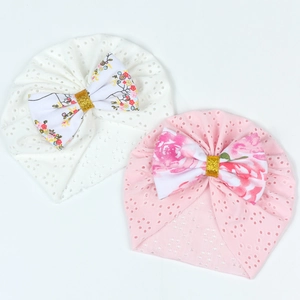 Breathable hollow-out newborn baby hats with floral bows and sequin accents, 2-pack set