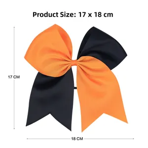 Detail view of a large orange and black Halloween bow hair tie measuring 18cm by 17cm