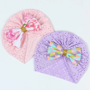 Breathable hollow knit newborn bow hats in pink and purple colors for infants