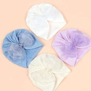 Set of four infant headwraps with large organza bows in white, blue, purple, and beige