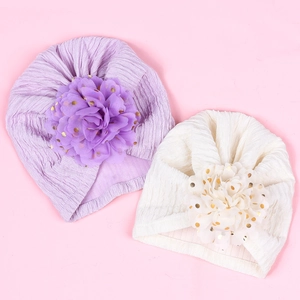 Infant turban hats in lavender and cream with large bronzing floral accents