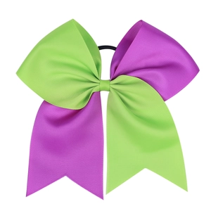 Detail of green and purple grosgrain ribbon bow with durable black elastic hair tie